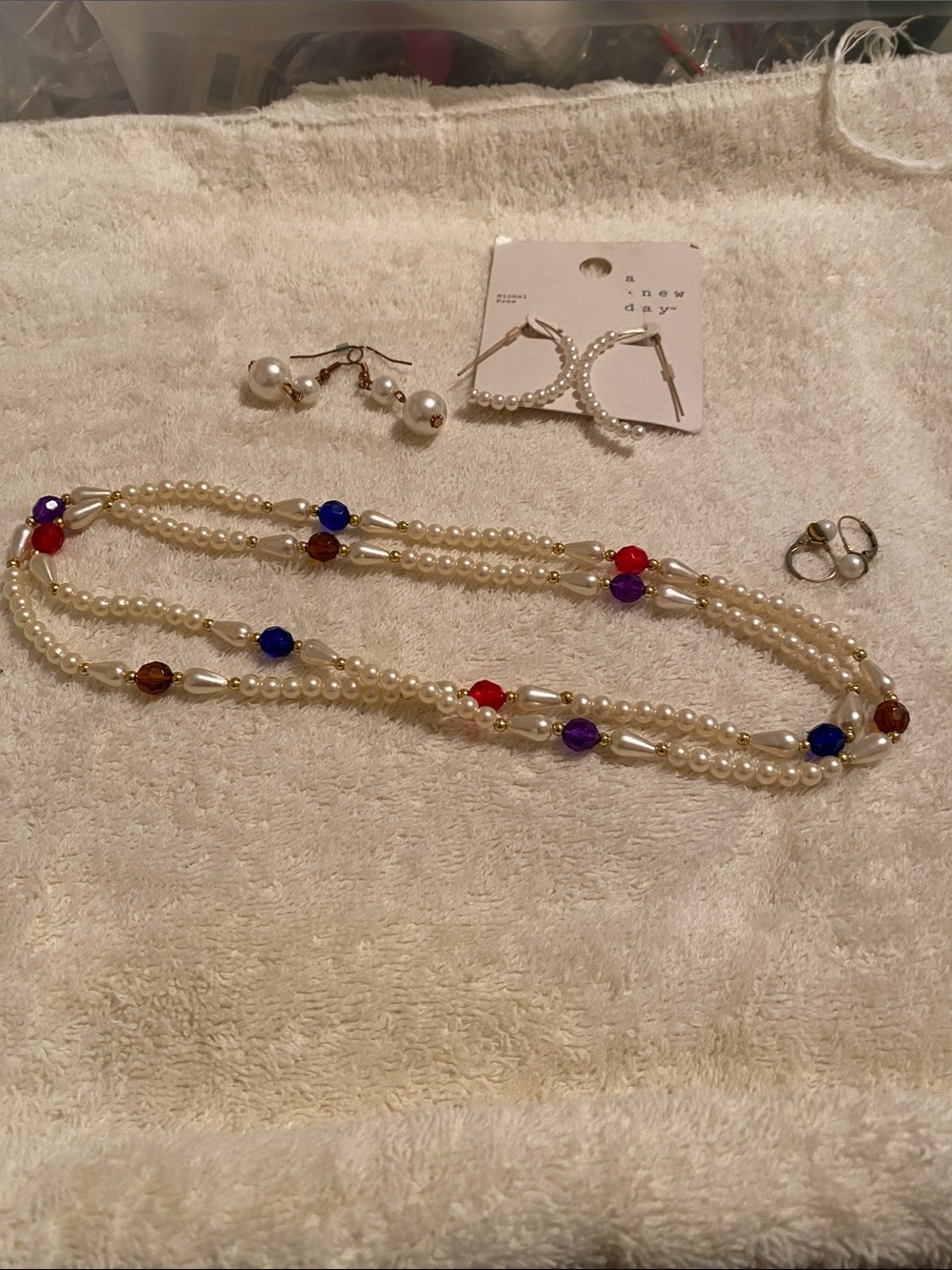 Three imitation pearl earrings -Strand Necklace with Red, Blue, Purple Accents